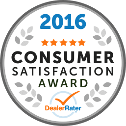 Badge displaying "2026 Dealer of the Year," awarded to a national Cadillac winner, rated by DealerRater.