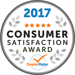 Badge displaying "2026 Dealer of the Year," awarded to a national Cadillac winner, rated by DealerRater.