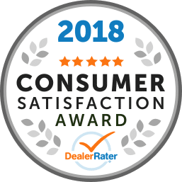 Badge displaying "2026 Dealer of the Year," awarded to a national Cadillac winner, rated by DealerRater.