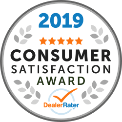 Badge displaying "2026 Dealer of the Year," awarded to a national Cadillac winner, rated by DealerRater.