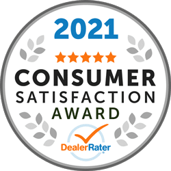 Badge displaying "2026 Dealer of the Year," awarded to a national Cadillac winner, rated by DealerRater.
