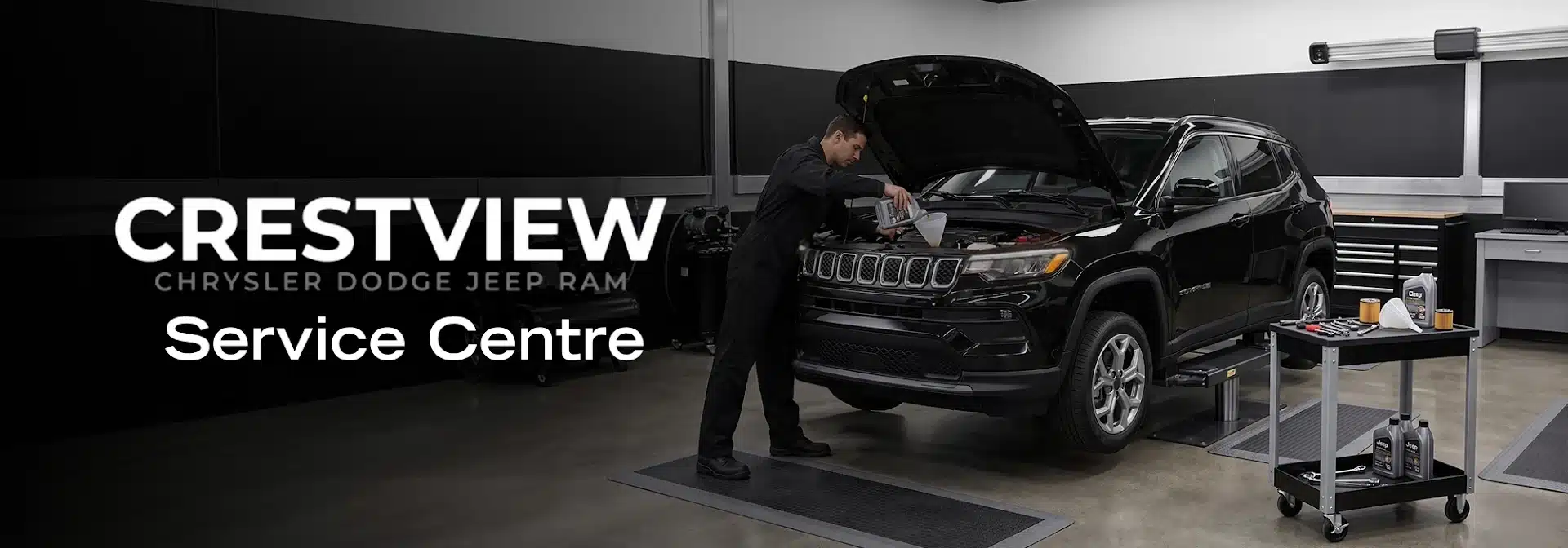 Mechanic servicing a Jeep at Crestview Chrysler Dodge Jeep Ram service center.